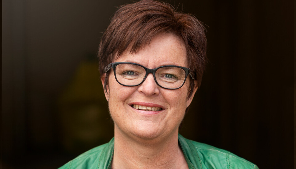 Portrettfoto av Heidi Greni med Grønn jakke.